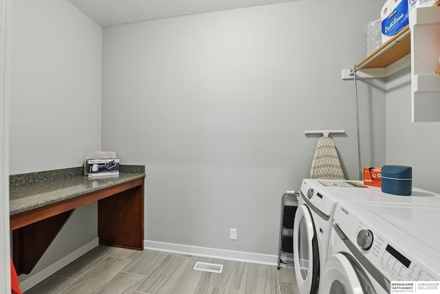 2614 N 191st Ave, Omaha, NE 68022 - laundry area featuring washer and dryer and baseboards