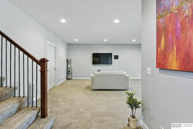 2614 N 191st Ave, Omaha, NE 68022 - carpeted living room featuring recessed lighting, stairs, and baseboards