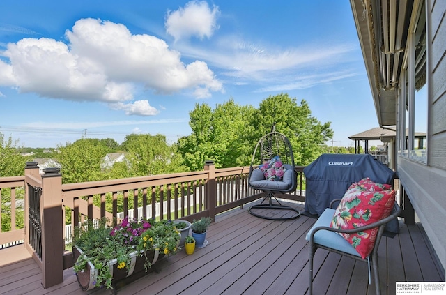 2614 N 191st Ave, Omaha, NE 68022 - wooden deck with a grill