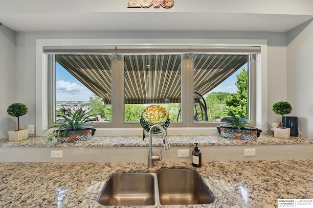 2614 N 191st Ave, Omaha, NE 68022 - kitchen view of a sink and light stone countertops