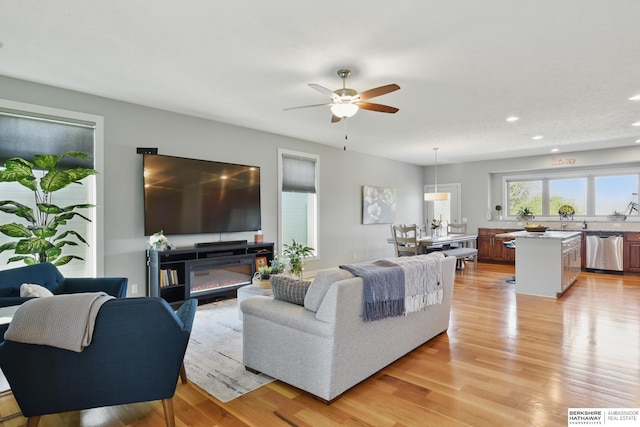 2614 N 191st Ave, Omaha, NE 68022 - living room featuring ceiling fan, light wood-style flooring, and recessed lighting