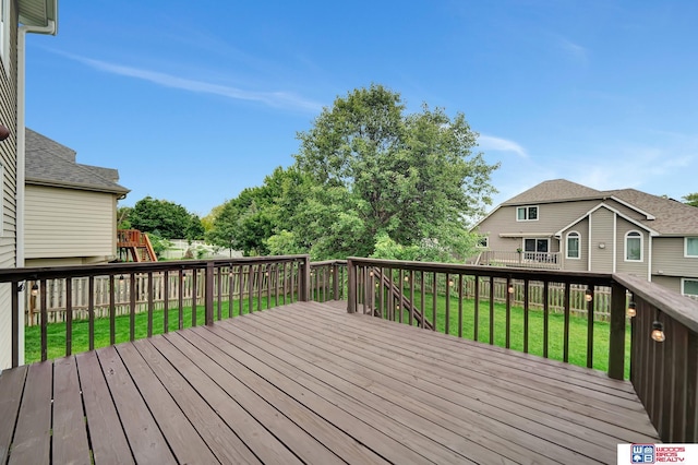 7910 Red Oak Rd, Lincoln, NE 68516 - wooden deck featuring a playground