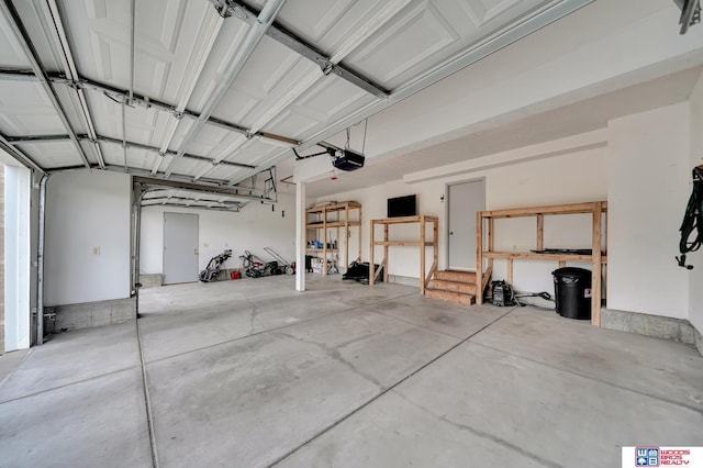 7910 Red Oak Rd, Lincoln, NE 68516 - garage featuring a garage door opener