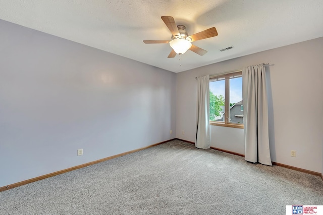 7910 Red Oak Rd, Lincoln, NE 68516 - empty room featuring carpet flooring, a ceiling fan, and baseboards