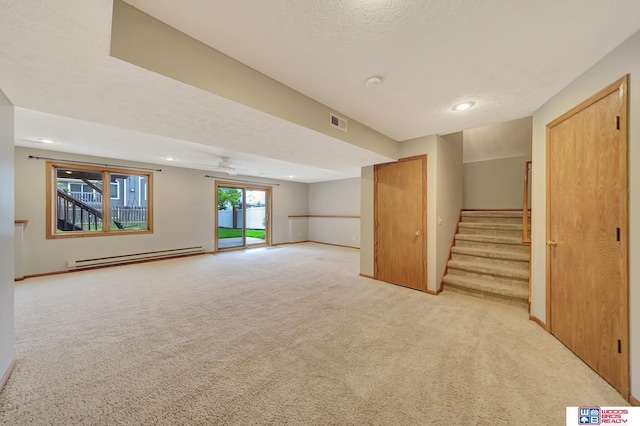 7910 Red Oak Rd, Lincoln, NE 68516 - empty room featuring a baseboard heating unit, stairs, light colored carpet, recessed lighting, and a ceiling fan