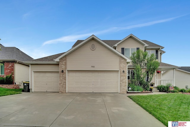 7910 Red Oak Rd, Lincoln, NE 68516 - traditional-style home featuring driveway, a garage, brick siding, and a front lawn