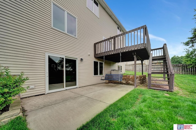 7910 Red Oak Rd, Lincoln, NE 68516 - back of property featuring stairs, a patio area, and a wooden deck