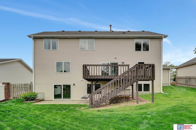 7910 Red Oak Rd, Lincoln, NE 68516 - rear view of house featuring stairway, a wooden deck, and a patio