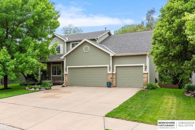 view of front of house featuring an attached garage, a front yard, concrete driveway, and roof with shingles