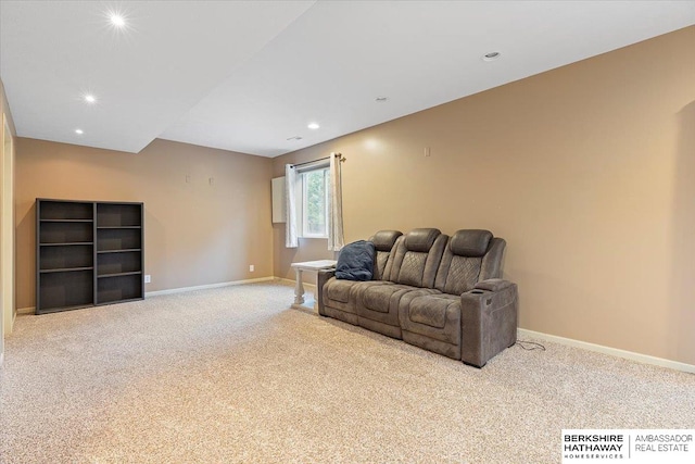carpeted living room with baseboards and recessed lighting
