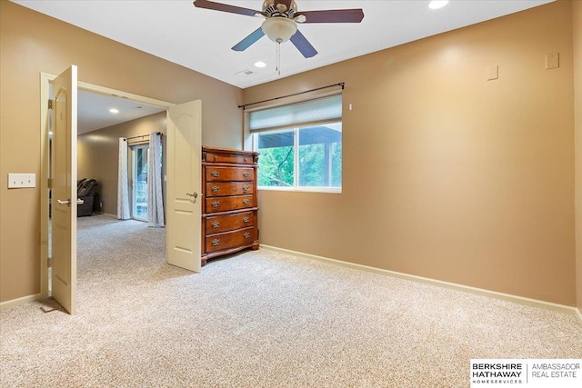spare room featuring light colored carpet, ceiling fan, baseboards, and recessed lighting