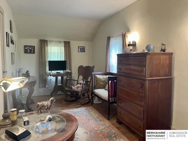 1200 H St, Pawnee City, NE 68420 - living area featuring lofted ceiling and wood finished floors