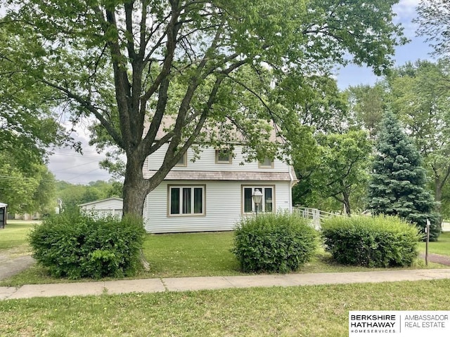 1200 H St, Pawnee City, NE 68420 - view of home's exterior with a yard