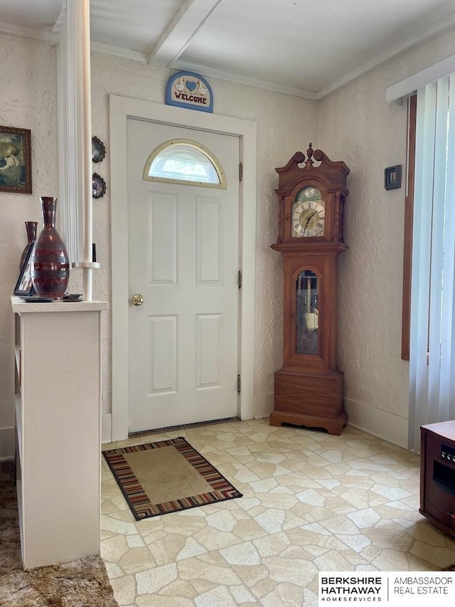1200 H St, Pawnee City, NE 68420 - foyer with beamed ceiling and ornamental molding