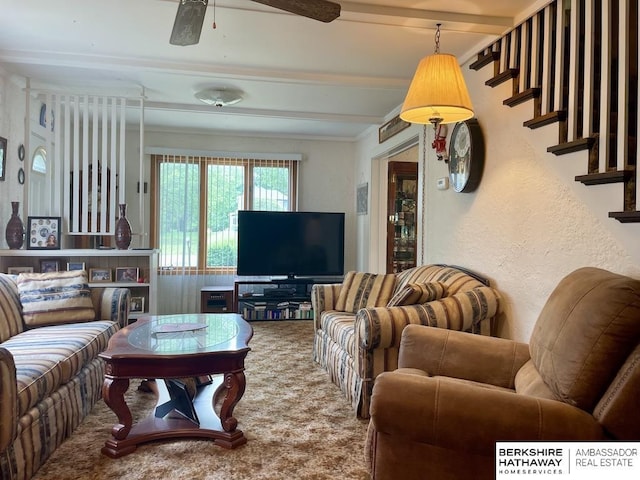 1200 H St, Pawnee City, NE 68420 - carpeted living area with beam ceiling, a ceiling fan, a textured wall, and crown molding
