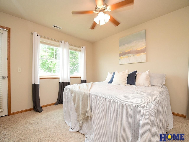 8946 Broken Spoke Dr, Lincoln, NE 68507 - bedroom with carpet floors, baseboards, and a ceiling fan