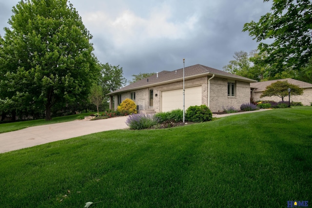 9160 Pioneer Ct, Lincoln, NE 68520 - view of front facade with an attached garage, brick siding, a front lawn, concrete driveway, and roof with shingles