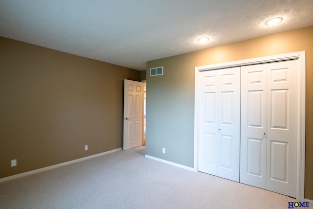 9160 Pioneer Ct, Lincoln, NE 68520 - unfurnished bedroom featuring carpet floors, baseboards, and a closet