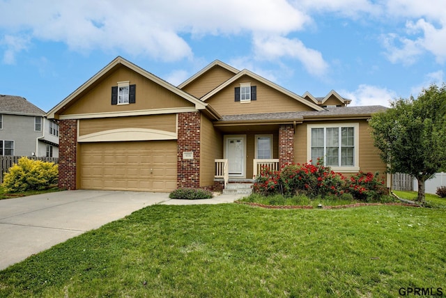 6732 S 169th Ave, Omaha, NE 68135 - view of front of house featuring brick siding, concrete driveway, and an attached garage