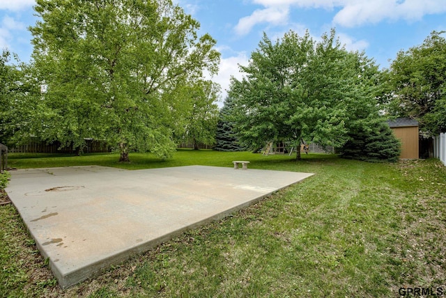 6732 S 169th Ave, Omaha, NE 68135 - view of yard with a playground and an outbuilding