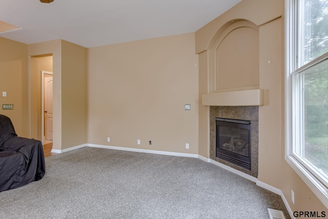 6732 S 169th Ave, Omaha, NE 68135 - unfurnished living room with carpet, a fireplace, and baseboards