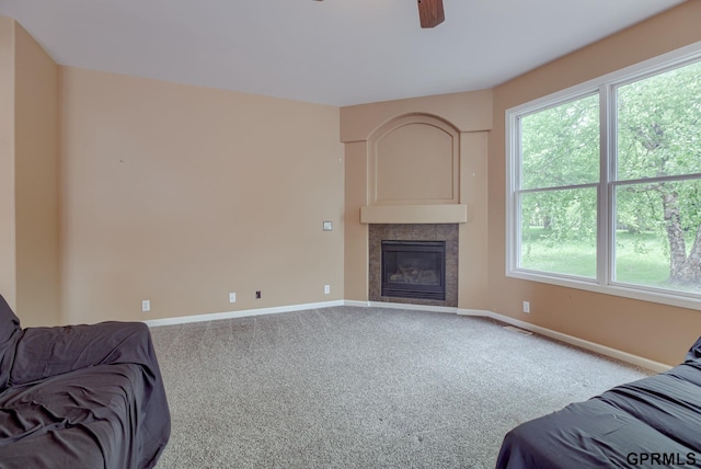 6732 S 169th Ave, Omaha, NE 68135 - carpeted living area with a ceiling fan, plenty of natural light, and baseboards