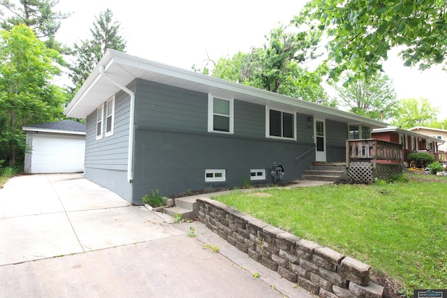 1425 Meadow Dale Dr, Lincoln, NE 68505 - single story home with a front yard, an outdoor structure, a garage, and a wooden deck