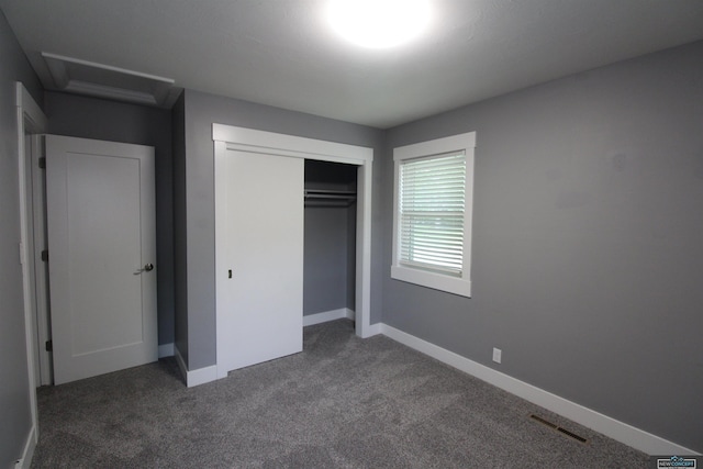 1425 Meadow Dale Dr, Lincoln, NE 68505 - unfurnished bedroom with carpet floors, attic access, a closet, and baseboards