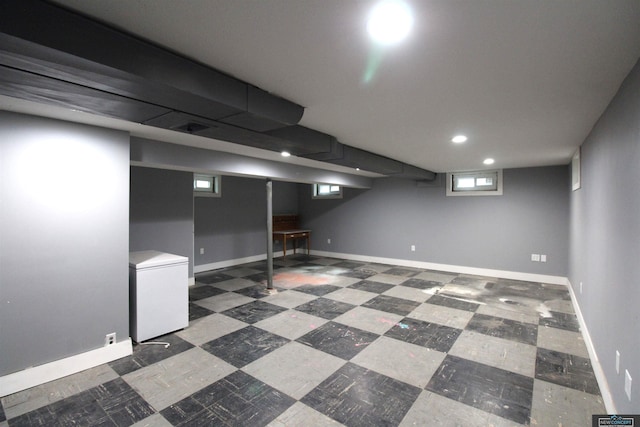 1425 Meadow Dale Dr, Lincoln, NE 68505 - below grade area with refrigerator, tile patterned floors, baseboards, and recessed lighting