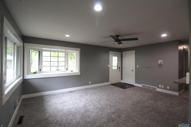 1425 Meadow Dale Dr, Lincoln, NE 68505 - entrance foyer featuring dark colored carpet, recessed lighting, baseboards, and a ceiling fan
