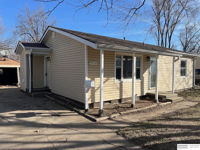 view of home's exterior with entry steps