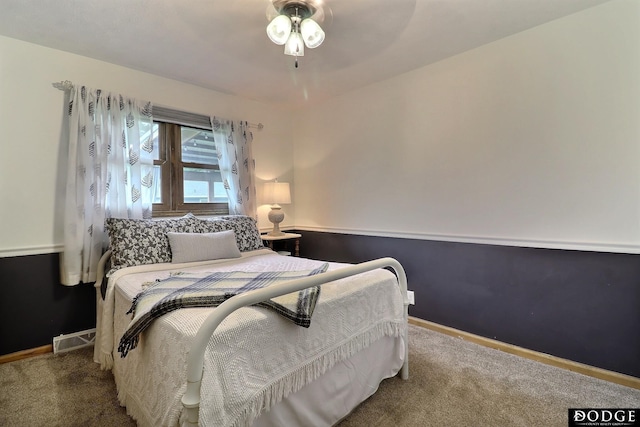 1131 Elizabeth Cir, Fremont, NE 68025 - carpeted bedroom with baseboards and ceiling fan