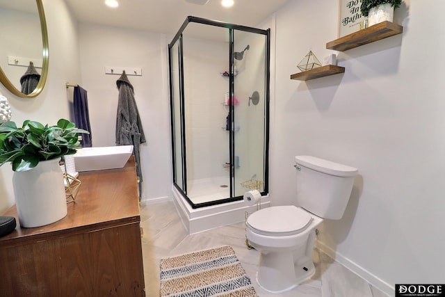 1131 Elizabeth Cir, Fremont, NE 68025 - bathroom with baseboards, a stall shower, toilet, recessed lighting, and vanity