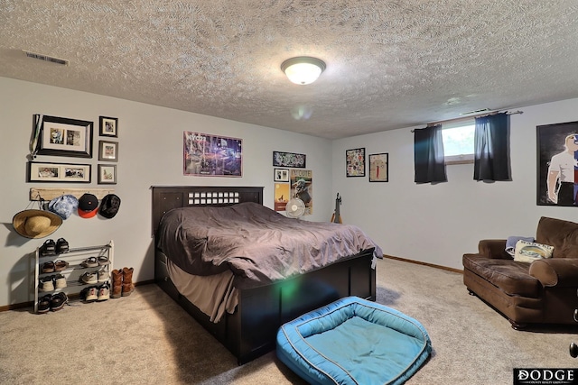 1131 Elizabeth Cir, Fremont, NE 68025 - carpeted bedroom featuring baseboards and a textured ceiling