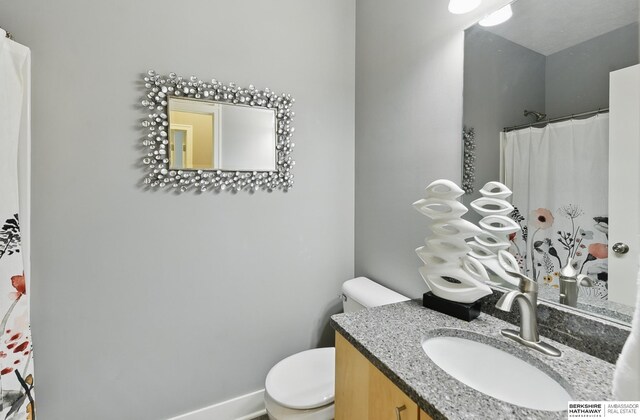 7211 S 174th St, Omaha, NE 68136 - full bathroom featuring toilet and vanity