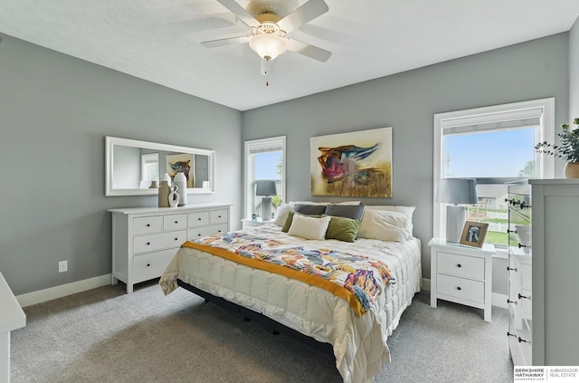 7211 S 174th St, Omaha, NE 68136 - bedroom with light carpet, baseboards, and a ceiling fan