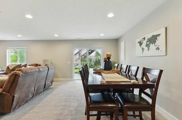 7211 S 174th St, Omaha, NE 68136 - dining space with light colored carpet, recessed lighting, and baseboards