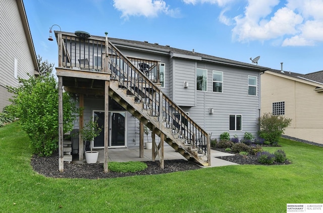 7211 S 174th St, Omaha, NE 68136 - back of property featuring stairway, a yard, a patio, and a wooden deck