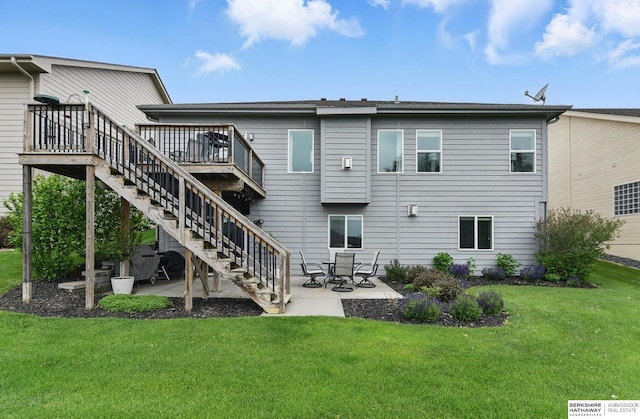 7211 S 174th St, Omaha, NE 68136 - back of property featuring a patio area, stairs, a lawn, and a wooden deck