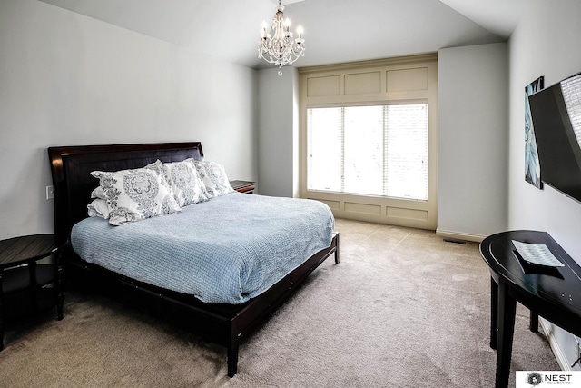 3400 Firethorn Ter, Lincoln, NE 68520 - bedroom with a chandelier and light colored carpet