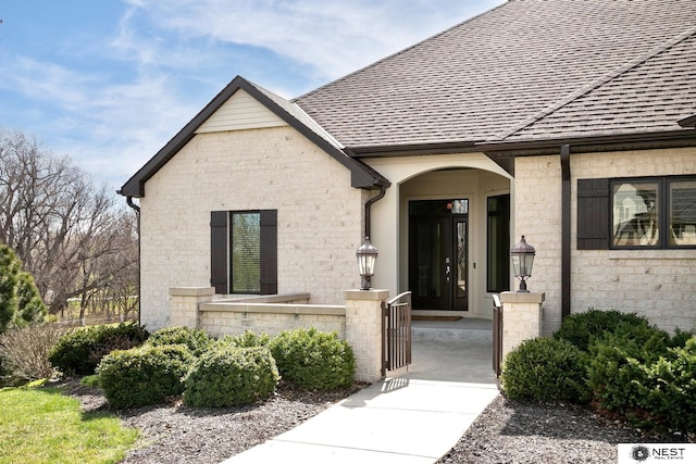 3400 Firethorn Ter, Lincoln, NE 68520 - view of front facade featuring stone siding and roof with shingles