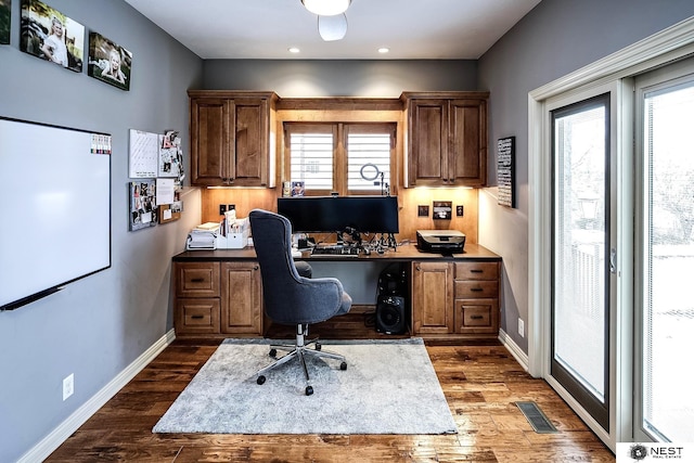 3400 Firethorn Ter, Lincoln, NE 68520 - office with dark wood-type flooring, baseboards, recessed lighting, and built in study area