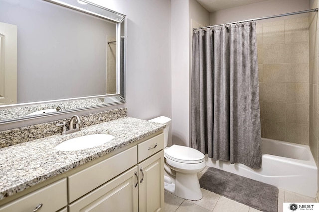 3400 Firethorn Ter, Lincoln, NE 68520 - full bathroom with tile patterned floors, toilet, shower / bath combo, and vanity