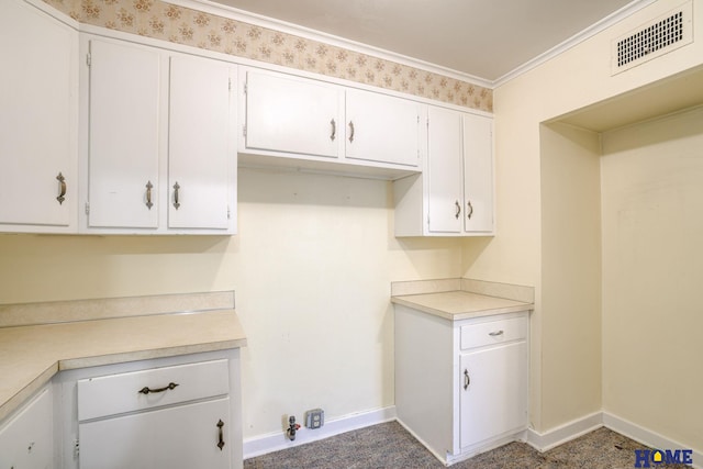 500 S 41st St, Lincoln, NE 68510 - laundry room with baseboards and ornamental molding