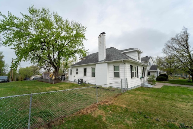 1822 N 60th St, Omaha, NE 68104 - view of side of property featuring a chimney, cooling unit, and roof with shingles