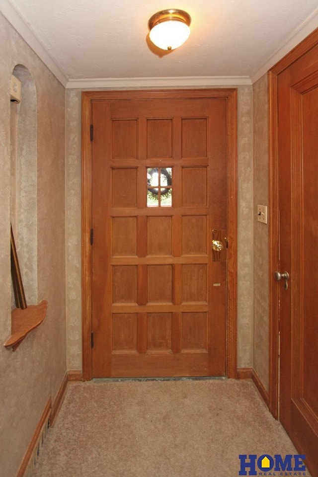 2727 S 19th St, Lincoln, NE 68502 - entryway featuring carpet flooring, baseboards, and wallpapered walls