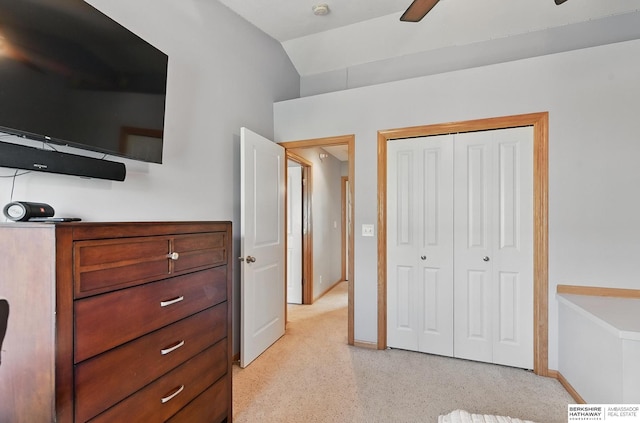 6031 N 167th Ct, Omaha, NE 68116 - bedroom featuring a closet, baseboards, lofted ceiling, and a ceiling fan