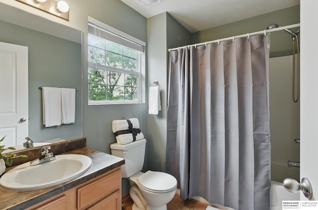 6031 N 167th Ct, Omaha, NE 68116 - bathroom featuring vanity, toilet, and a shower with shower curtain
