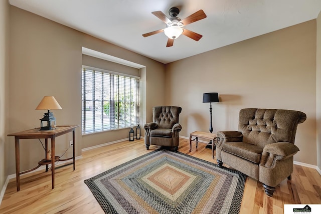 8420 Augusta Dr, Lincoln, NE 68526 - sitting room featuring light wood-type flooring, a ceiling fan, and baseboards