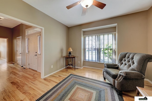 8420 Augusta Dr, Lincoln, NE 68526 - sitting room featuring light wood-type flooring, ceiling fan, and baseboards